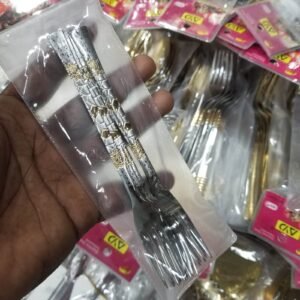 Goden and silver tea n fork spoon